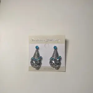 Silver Plated Ice Cream shaped Earrings with light blue studs. Also a second pair of light blue studded earrings .