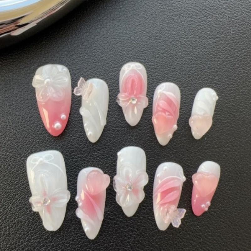 Mid almond 23mm style nail art, pink and white gradient -3D decoration of flowers, butterflies, pearls, and rhinestones, with a fairy like and gentle sweet element, so dreamy and girlish!