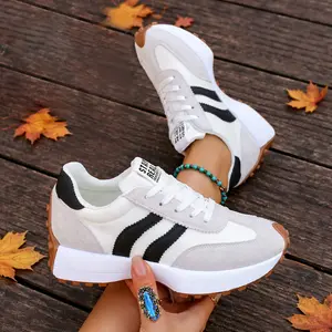 Women’s retro color-block low-top sneakers — lightweight and comfortable, suitable for all seasons — modern fashion casual shoes with a minimalist design and secure lace closure.