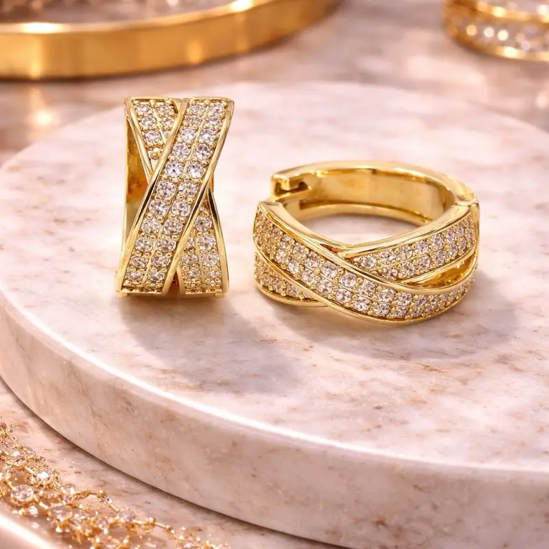 Aretes Huggies Cruzados Oro Laminado 14K