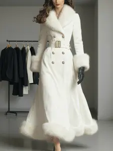 A Luxurious Long Coat in Deep Blue Velvet for Women, Featuring a Vintage, Double-Breasted Design, And a Fitted Waist Without a Belt