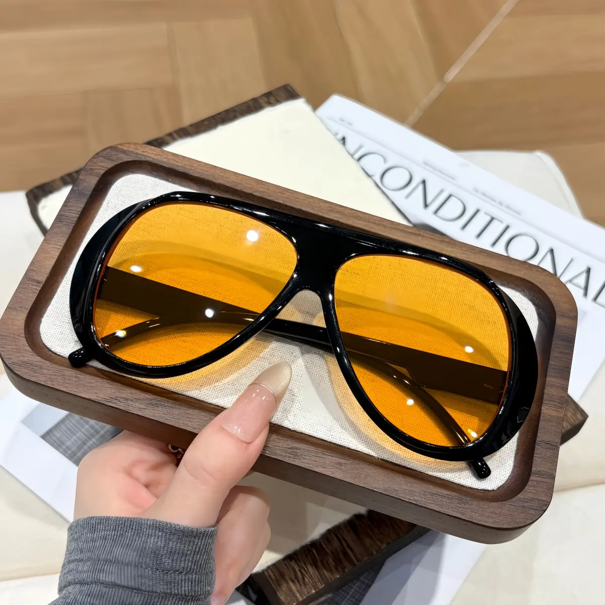 Black frame orange tablets