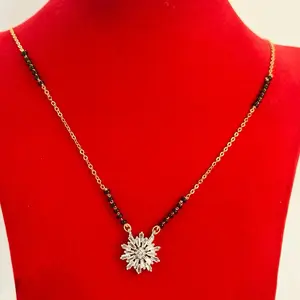 Gold plated daily use Nepali Mangalsutra with black potey and multiple stone work on it.