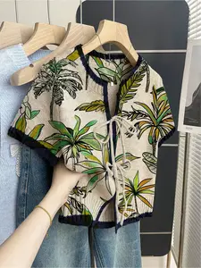 Women's khaki bohemian vacation short-sleeve knit top. Loose round neck, contrast tree print, front tie and contrast piping. Comfortable for spring & summer casual wear. Womenswear
