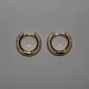 Stellia Hoops Earrings with Decorative Elements and Clear Center Stone