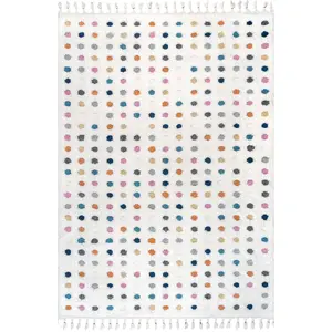 Behati Polka Dot Kids Tasseled Area Rug