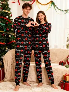 2-piece Valentine's Day-themed pajama set for both men and women, Long sleeve, black background with red pattern, full printed with heart and 'Love' elements, suitable for Valentine's Day gatherings, daily home relaxation