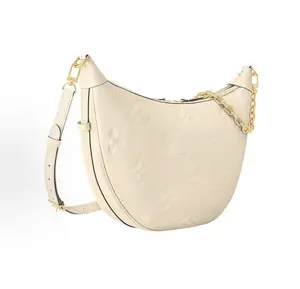 Pre-owned Louis Vuitton leather Shoulder Bags Loop Hobo Bag in Crème Monogram Empreinte with Natural Cowhide Trim Gold tone Hardware Fashion Accessory