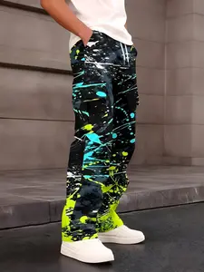 One-piece fluorescent green and blue splatter paint spliced men's cargo pants with American retro style and multi-pocket design