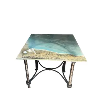 Resin Ocean Sidetable with Oceanic Design, Black Frame, and Decorative Elements