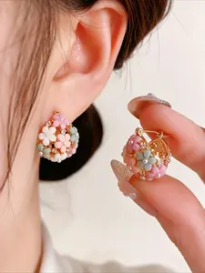 A pair of fashionable floral ring earrings for women, alloy with resin inlay, suitable for daily wear and weddings