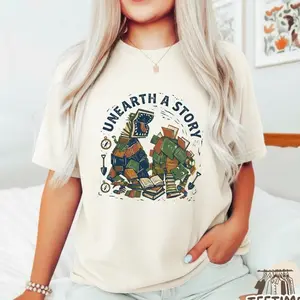 Unearth A Story Shirt, Summer Reading 2026, Dinosaur Book Stack, Retro Aesthetic Paleontology, Librarian Teacher Reader, Book Lover Gift W