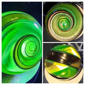 Medium Size Blown 1-1/2 inch glass Uv reactive marble. Made borosilicate UV glass, commonly known as Vaseline glass. Tiktok Live Blown Glass Marble made from borosilicate glass AKA Pyrex for Durability. Created by Jason @TheFieryGuy
