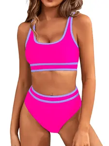 This is the MOSHU High Waisted Color Block Bikini Set: a sporty two-piece swimsuit with a high-cut design that's a true statement in effortless chic.