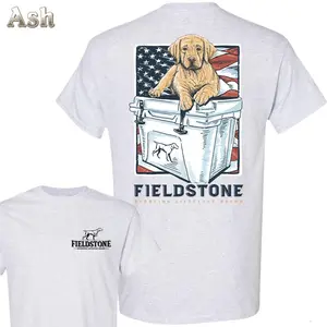 Fieldstone Labrador Puppy Graphic T-Shirt, Features Yellow Labrador Puppy On Cooler With American Flag Background And Fieldstone Chest Logo, Sporting Lifestyle, Unisex Graphic Tee, Gift For Dog Lovers, Top Menswear Streetwear Casual