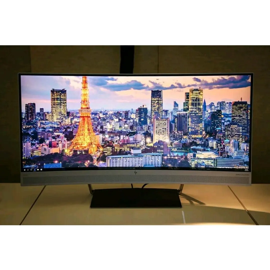 HP 24-inch Curved Monitor with Stunning Cityscape Display and Modern Design