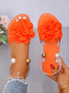 Women's Orange Flower Embellished Sandals - Pearl & Gold Bead Ankle Strap Flat Summer Footwear #floralsandals #pearlanklestrapsandals #summersandals #tiktokshoefinds #vacationshoes