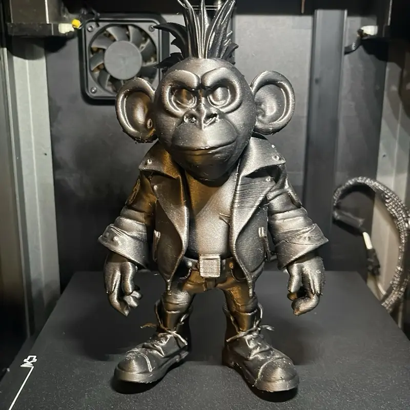 Cool Looking Money in Black Leather - Unique Design Featuring a Monkey Figure in Stylish Attire