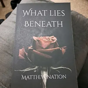 What Lies Beneath Paperback - Autographed