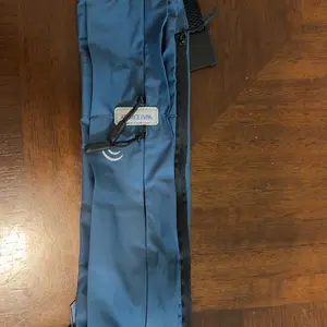 WATERFLY Slim Running Belt Fanny Pack for Women Men Phone Holder Runners Pouch Waist Belt for Workout Jogging Multifunctional Sports Bag water-resistant Outdoor Gear SpringStatements