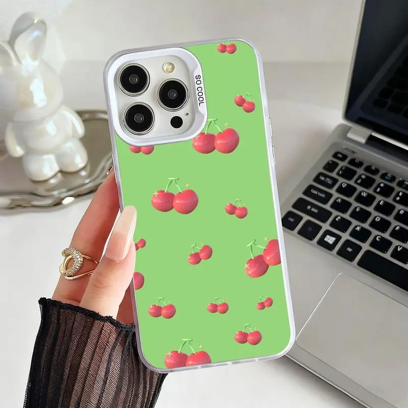 Light green phone case with red cherry print. Compatible with iPhone 17 Pro Max/16 Pro Max/15 Plus/14/13/12/11. Also available in silver. Compatible with Galaxy S26 Ultra/S25 Plus/S24/S23/S21. Perfect for birthdays or party gifts.