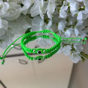 Beautiful Vibrant Neon Green Evil Eye Bracelet - Green Cord with Decorative Beads