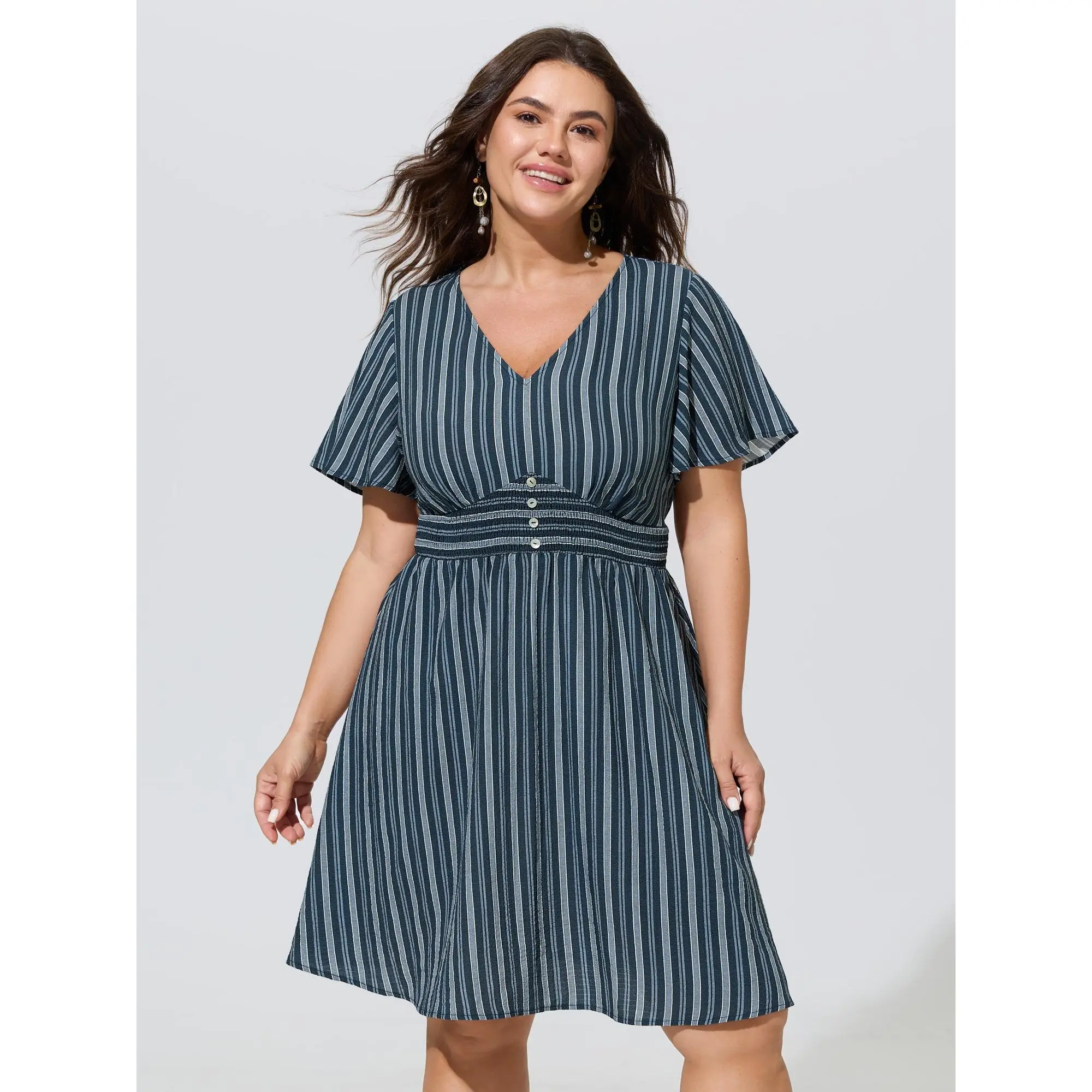 BLOOMCHIC Women's Plus Size Vertical Stripe Print Shirred Waist Mini Dress[M-6X] 2026 Summerfinds