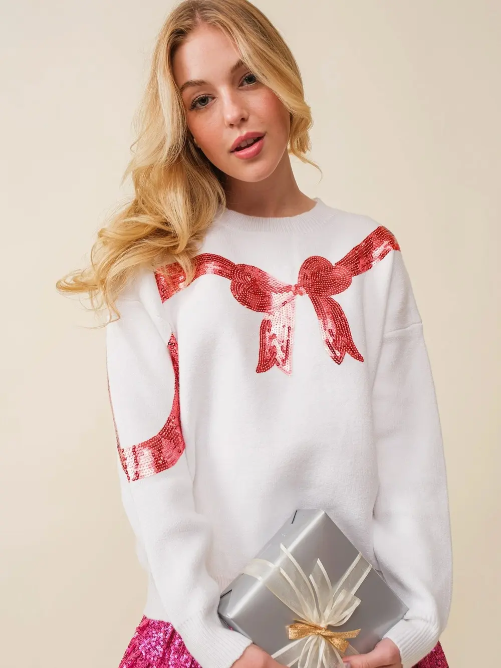 THE HOLLY SEQUIN BOW SWEATER