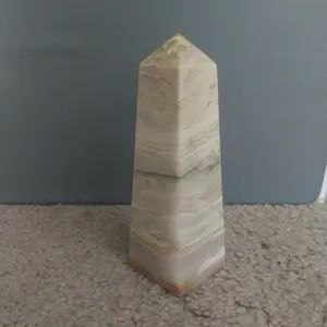 Green Banded Calcite: Aids in removing negativity and releasing energy blockages that prevent personal growth
