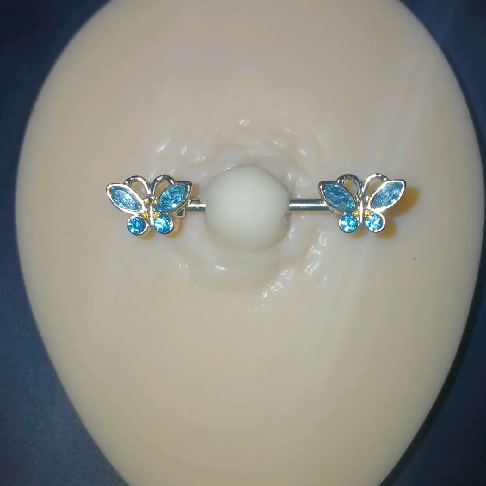 Blue Butterfly Nipple Piercing with Sparkling Gemstone Accents for Stylish Body Jewelry