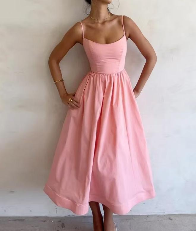 Lady's white simple and fashionable strapless dress - square neckline, fitted waist, sexy V-neck with waist crease and flowing long skirt with big waves. Trendy everyday brunch date attire for 2025.