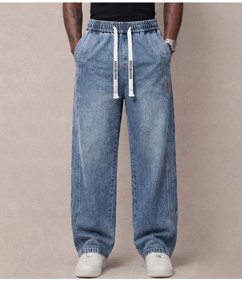 Men’s jeans made from stretchy cotton—comfortable and stylish. Loose fit for everyday wear; long pants with a drawstring elastic waistband design for men. Men’s jeans made from stretchy cotton—comfortable and stylish. Loose fit for everyday wear; long pants with a drawstring elastic waistband design for men.