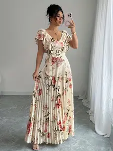 A women's apricot colored fashionable rose print pleated long dress, with a gentle print and a flowing pleated skirt suitable for commuting to work, shopping and outdoor activities, indoor and outdoor dressing