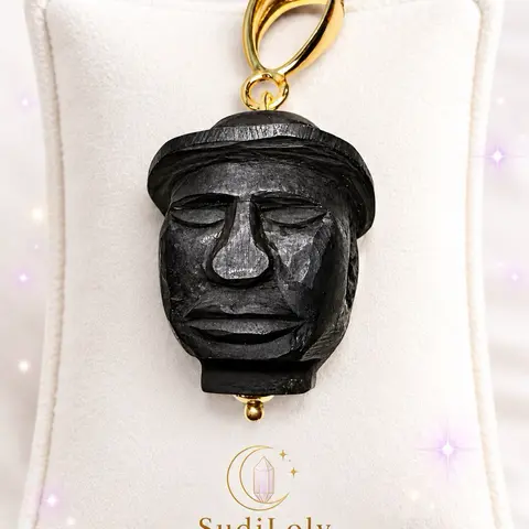 Dije de rostro de hombre y mujer hecho a mano