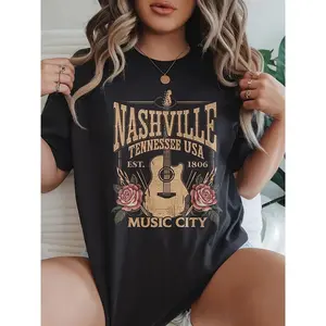 Nashville Music City Graphic Tee: Edgy Guitar & Roses Print on Soft, Oversized Womens T-Shirt. Perfect for Concerts, Travel & Casual Street Style. Tennessee USA Vintage Vibe.