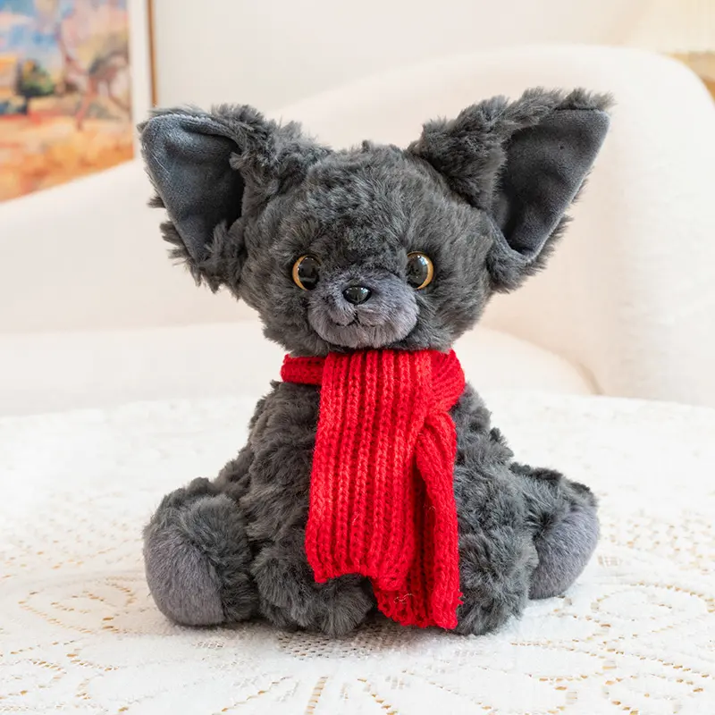 Soft fluffy plush cat with large ears — small gray cat; soothing pose; German-style cat plush figurine; desktop companion decorative piece
