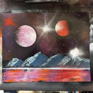 Galactic Graffiti Spray Paint Art - Planets over Mountains with Mountains, Trees and Water.