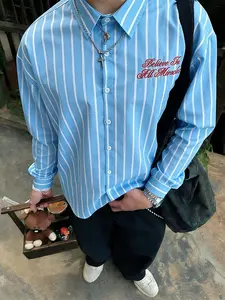Men's Blue and White Striped Embroidered Button-Down Shirt—a Loose-Fitting, Street-Style Top Perfect for Everyday Casual Wear and Daily Outings.