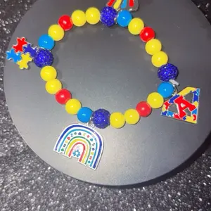 Autism Awareness Charm Bracelet with Colorful Beads and Rainbow Pendant for Support and Visibility