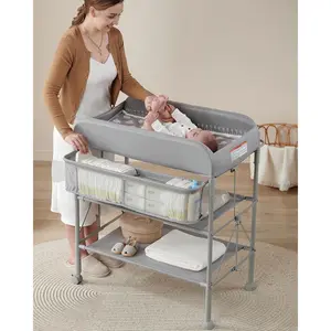 Portable folding diaper changing station for babies, waterproof adjustable-height mobile changing table with organizer, perfect for a newborn nursery