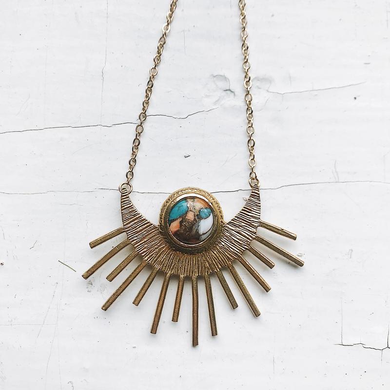 Celestial Jewelry Collection Gold Sun Pendant with Blue Stone Necklace for Women Cosmic Aesthetics Versatile Designs Perfect for Any Occasion