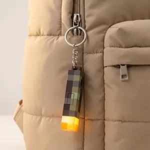 World Mini Pixel Torch Keychain Flashlight | USB Rechargeable LED Light Charm. Compact & Lightweight Retro Gaming Gift, Ideal Christmas Stocking Stuffer for Gamers, Boys, and Kids. Enchanting Glow Light for Backpacks, Keys, and Desk Deco