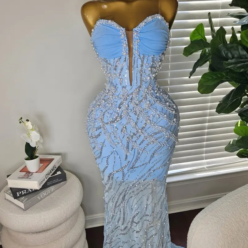 Strapless Mermaid Dress with Beaded detailing. Perfect for special occasions