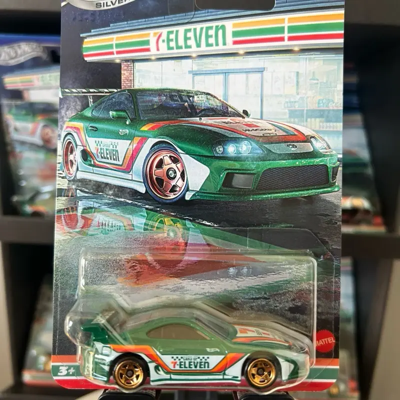 Hot Wheels Supra 7-11 Green Die-Cast Car Model with 7-Eleven Theme and Silver Wheels for Collectors Age 3+