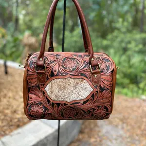 Medium Tooled Leather and Cowhide Speedy Crossbody Purse. 12x8x9” comes with crossbody strap