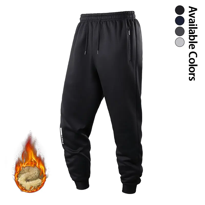 Men’s fleece-lined jogging pants with an elastic waistband and drawstring, warm sports trousers with zippered pockets—ideal for winter casual workouts; men’s long pants.