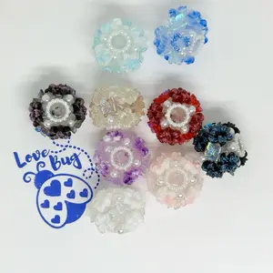 5pcs mixed fancy beads with roses and crystal butterflies. Elevate your style today these are perfect for pens, keychains, purse, charms or any other DIY project.