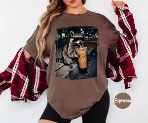 Comfort Colors Raccoon Drinking Iced Coffee Shirt, Retro Prehistoric Shirt, Gift For Animal Lover, Funny Animal Meme Tee,Coffee Raccoon Tee