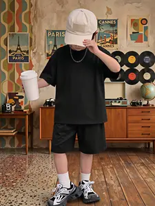 Boys' Streetwear T-Shirt and Shorts Set - Solid black, slightly stretchy polyester two-piece set; loose-fitting summer loungewear for kids; trendy, hip-hop-inspired outfit for boys