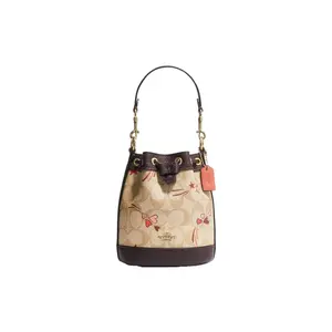 Coach Bucket 16 Handbag for Women – Monogram Heart Print Drawstring Tote in Beige and Dark Brown Jacquard Leather